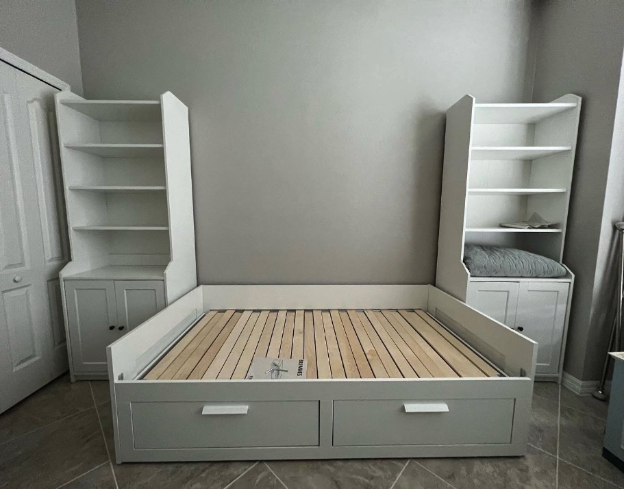 IKEA bed frame with storage drawers and shelving units fully assembled — Quality Handyman Services Tampa